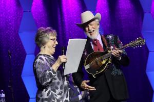 Pigeon Forge City Manager Earlene Teaster officially proclaims September 24 as Doyle Lawson day in Pigeon Forge, TN at the Inaugural Pigeon Forge Bluegrass Festival