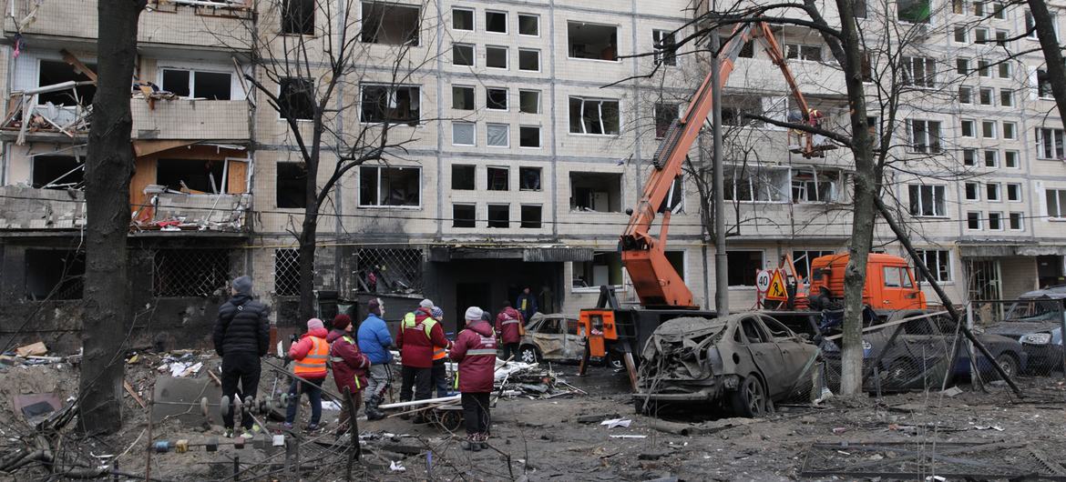 Rescue workers clean up following an airstrike on the Ukrainian capital, Kyiv, on 12 December, 2023. Rescue workers clean up following an airstrike on the Ukrainian capital, Kyiv, on 12 December, 2023.