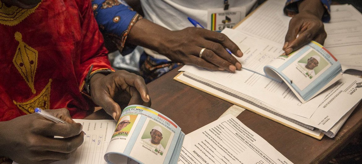 Election officials in Mali prepare materials for the second round of the presidential elections on the day of the vote at a polling station in the Banaconi district in Bamako in 2018. (file) Election officials in Mali prepare materials for the second round of the presidential elections on the day of the vote at a polling station in the Banaconi district in Bamako in 2018. (file)