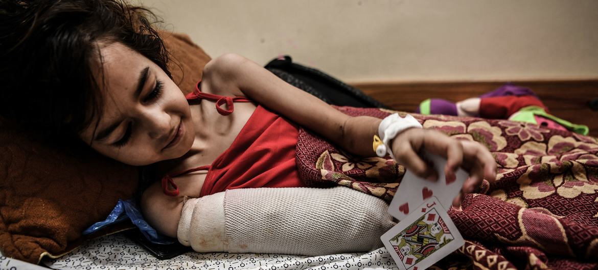 A young girl from Gaza City recovers from the amputation of part of her arm following a missile strike on her home. A young girl from Gaza City recovers from the amputation of part of her arm following a missile strike on her home.