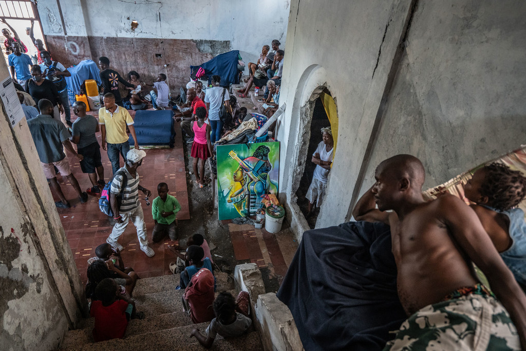 People who have fled their homes due to insecurity find shelter at a theatre in downtown Port-au-Prince. People who have fled their homes due to insecurity find shelter at a theatre in downtown Port-au-Prince.