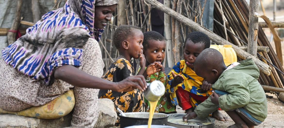 Children having porridge following the resumption of refugee food assistance in the Bokolmayo refugee camp in the Somali region of Ethiopia. Children having porridge following the resumption of refugee food assistance in the Bokolmayo refugee camp in the Somali region of Ethiopia.