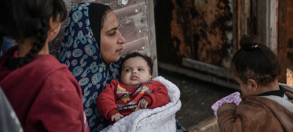 A family forced to evacuate their home in Gaza now live in a refugee camp in Rafah. A family forced to evacuate their home in Gaza now live in a refugee camp in Rafah.