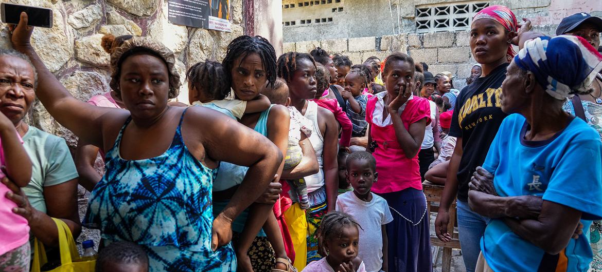 Children are taken by their mothers for nutrition screening in the Delams neighbourhood of Port-au-Prince, Haiti. Children are taken by their mothers for nutrition screening in the Delams neighbourhood of Port-au-Prince, Haiti.
